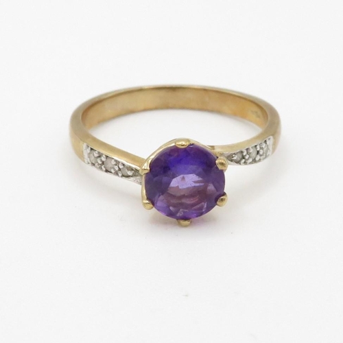 27 - 9ct gold diamond accented amethyst dress ring (2.4g) Size  N