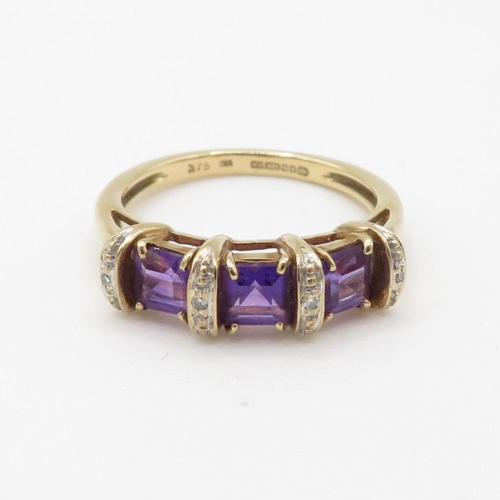 48 - 9ct gold amethyst three stone ring with diamond spacers (2.8g) Size  M