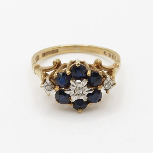 82 - 9ct gold diamond and sapphire set cluster ring (2.6g) Size  M