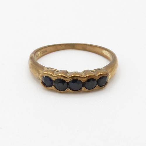 91 - 9ct gold sapphire set five stone eternity ring (2.3g) Size  P