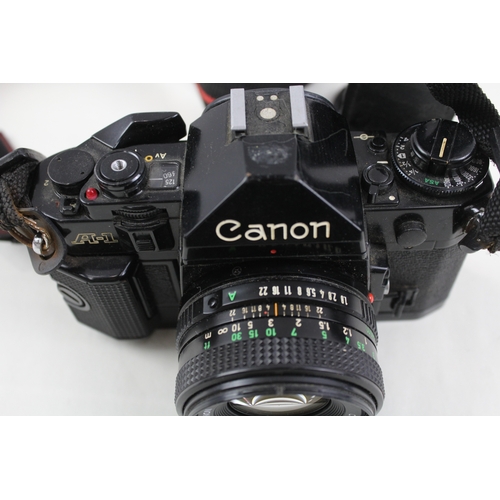 372 - Canon A-1 SLR Vintage Film Camera Black Working w/ Canon FD 50mm F/1.8 Lens