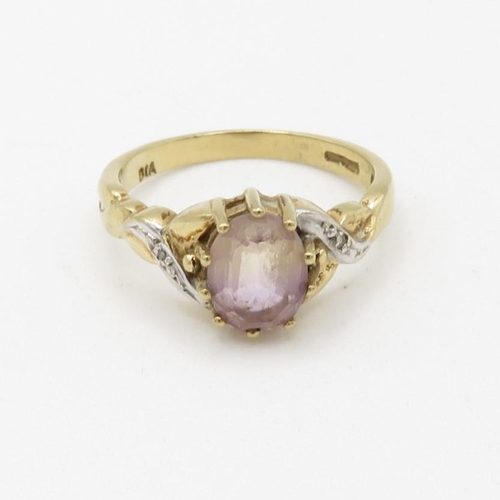 131 - 9ct gold diamond accented ametrine set dress ring (2.4g) Size  N