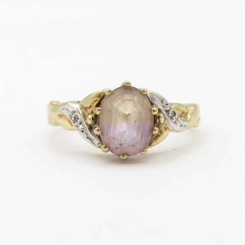 131 - 9ct gold diamond accented ametrine set dress ring (2.4g) Size  N