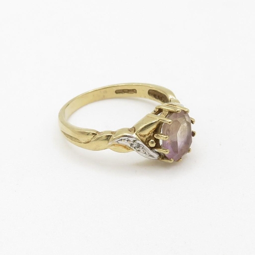 131 - 9ct gold diamond accented ametrine set dress ring (2.4g) Size  N