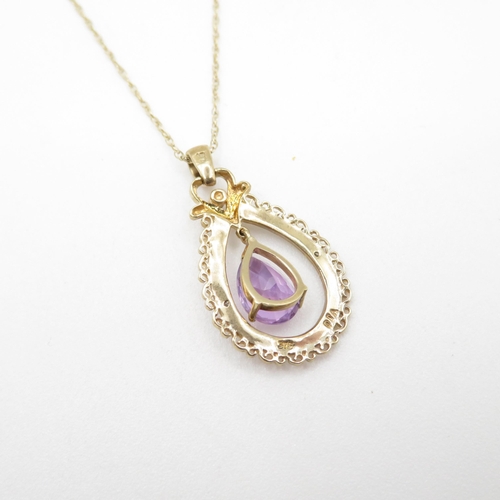 172 - 9ct gold diamond and pear cut amethyst set pendant necklace (3g)