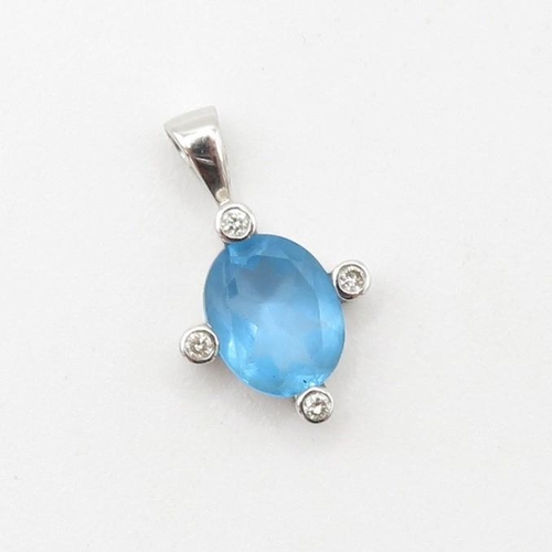 34 - 18ct gold diamond and topaz pendant (1.6g)