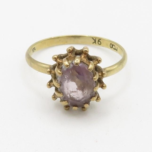 115 - 9ct gold claw set amethyst solitaire ring (1.6g) Size  L