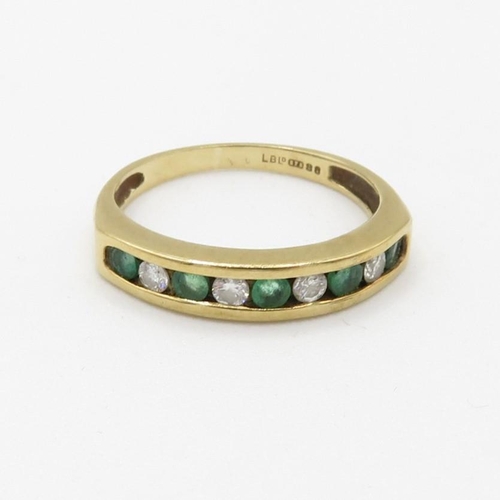 120 - 9ct gold channel set emerald and diamond set nine stone eternity ring (1.9g) Size  K