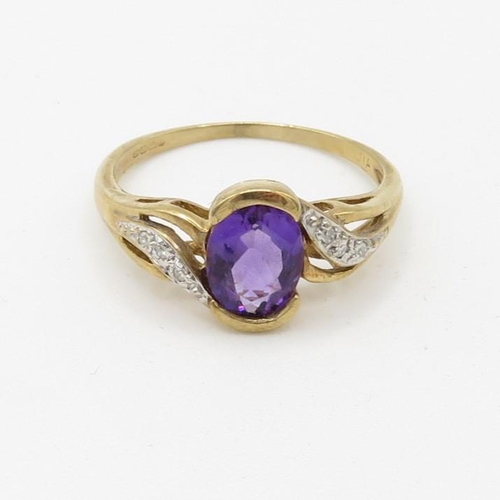 144 - 9ct gold diamond accented amethyst set dress ring (2.2g) Size  O