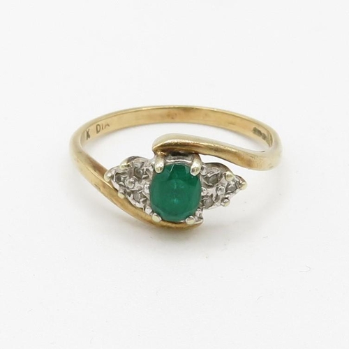 151 - 9ct gold diamond and green gemstone set dress ring (1.9g) Size  M