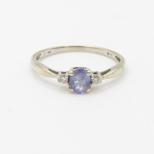 153 - 9ct gold diamond and tanzanite set dress ring (1.3g) Size  O