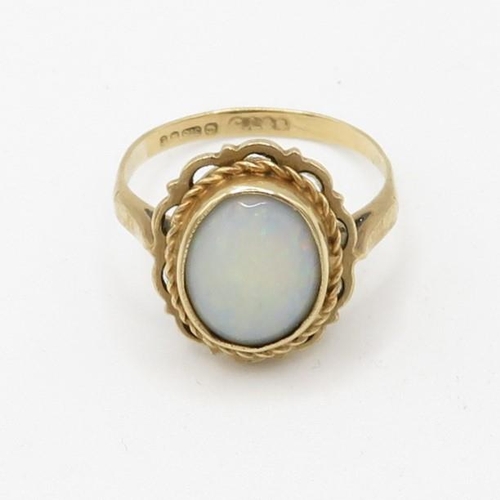 179 - 9ct gold ornate rope edged opal set dress ring (2.7g) Size  L