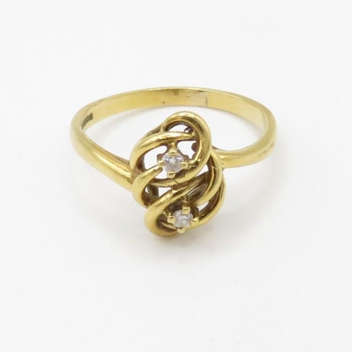 197 - 18ct gold diamond set eternal knot celtic style dress ring (3.5g) Size  P