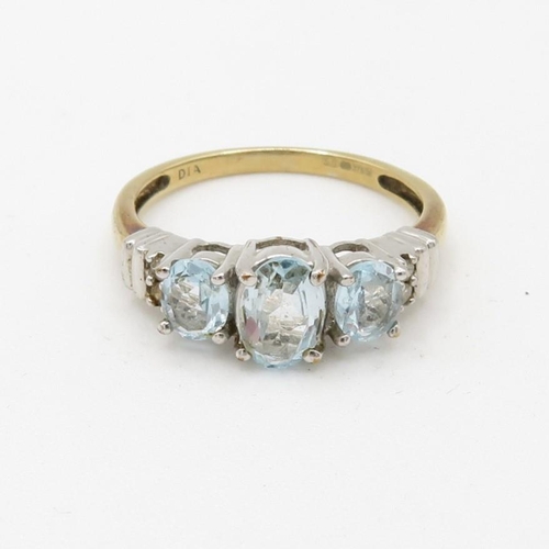 208 - 9ct gold diamond and blue topaz set dress ring (2.2g) Size  O