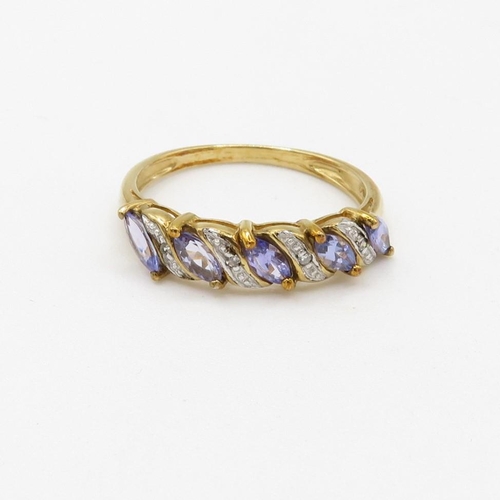 23 - 9ct gold diamond accented marquise cut tanzanite five stone eternity ring (2.1g) Size  P