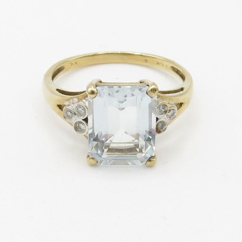 94 - 9ct gold diamond and aquamarine set cocktail ring (2g) Size  O