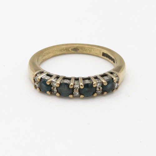 150 - 9ct gold diamond and blue topaz set half eternity ring (2.8g) Size  M