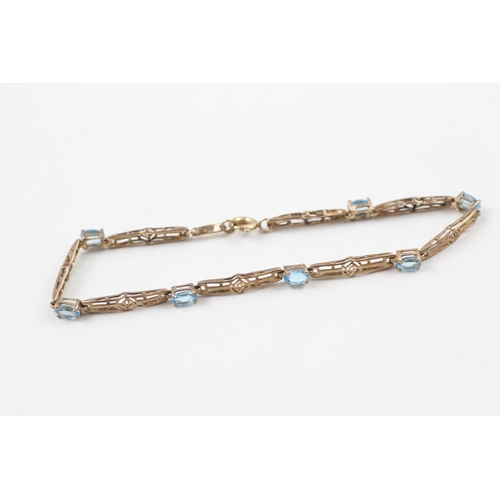 23 - 9ct gold topaz bracelet with Mackintosh inspired design (3.9g)