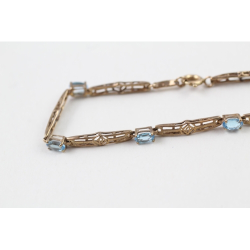 23 - 9ct gold topaz bracelet with Mackintosh inspired design (3.9g)