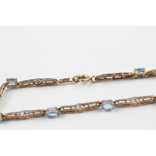 23 - 9ct gold topaz bracelet with Mackintosh inspired design (3.9g)