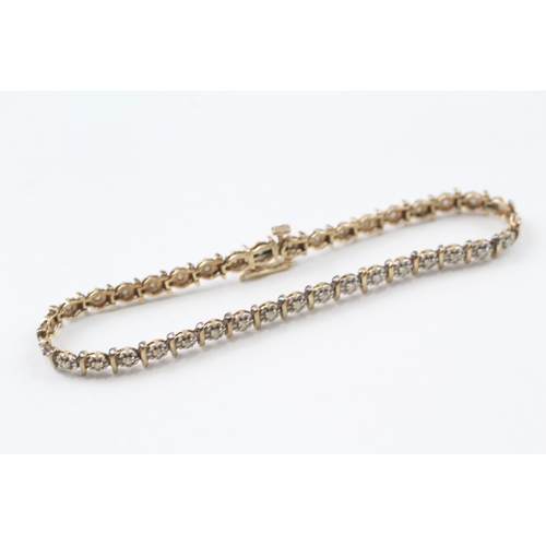 24 - 9ct gold diamond line bracelet (7g)