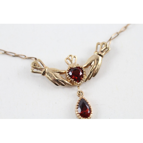 37 - 9ct gold garnet Irish claddagh necklace (2.9g)