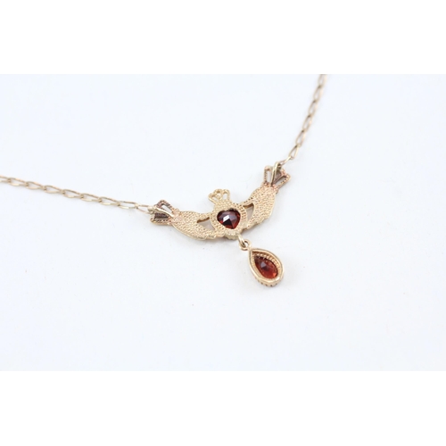 37 - 9ct gold garnet Irish claddagh necklace (2.9g)