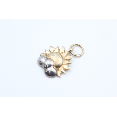 12 - 9ct white and yellow gold sunrise charm (0.9g)