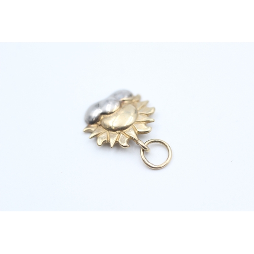 12 - 9ct white and yellow gold sunrise charm (0.9g)