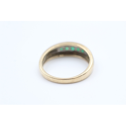 2 - 9ct gold white and yellow gold emerald set five stone eternity ring (2.3g) Size N