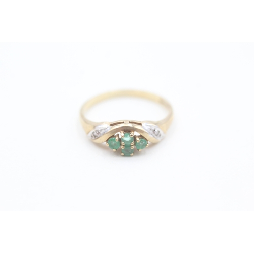 4 - 9ct gold diamond and emerald set wishbone shaped band ring (1.5g) Size L