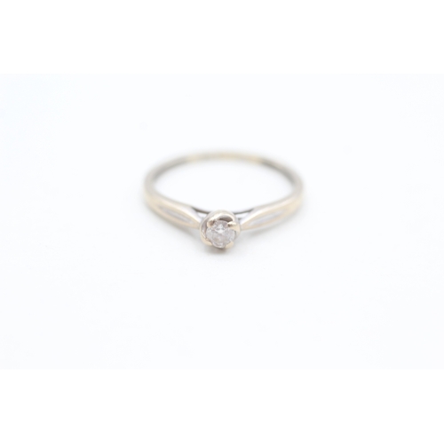 6 - 9ct white gold diamond set solitaire ring (1.3g) Size K