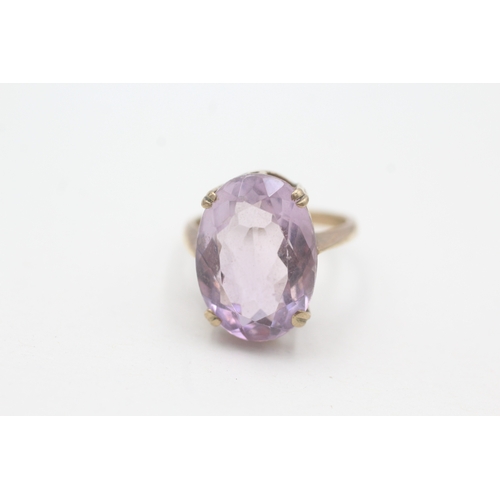 64 - 9ct gold amethyst cocktail ring (5.6g) Size O