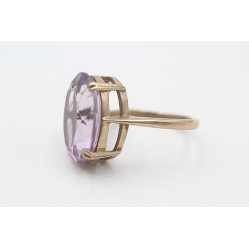 64 - 9ct gold amethyst cocktail ring (5.6g) Size O