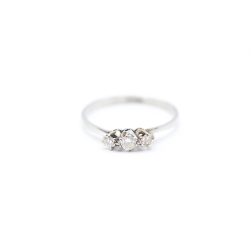 75 - Platinum 850. diamond three stone ring (1.8g) Size N