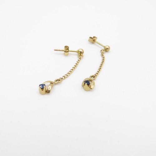 20 - 2 x 9ct gold earrings including diamond and sapphire (1.9g)