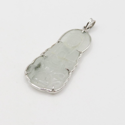 85 - 14ct gold carved jade pendant (8.8g)