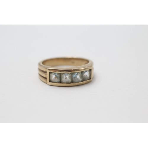 108 - 9ct gold square cut aquamarine dress ring (4.4g) Size  O