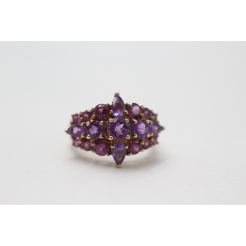 110 - 9ct gold amethyst & purple garnet dress ring (4.4g) Size  M