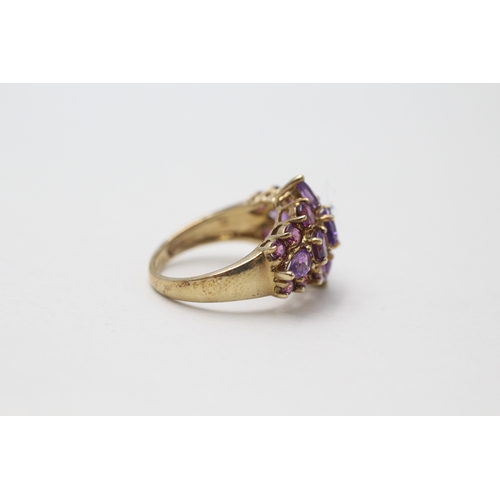 110 - 9ct gold amethyst & purple garnet dress ring (4.4g) Size  M