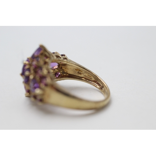 110 - 9ct gold amethyst & purple garnet dress ring (4.4g) Size  M