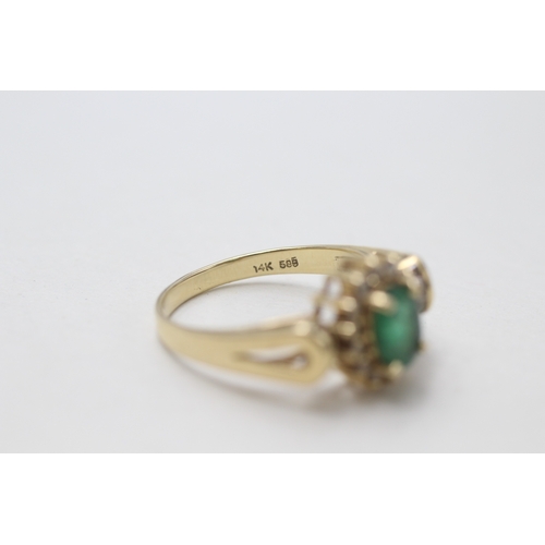 111 - 14ct gold emerald & diamond dress ring (3.7g) Size  O 1/2