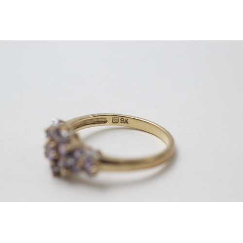 115 - 9ct gold tanzanite & diamond dress ring (2.4g) Size  P