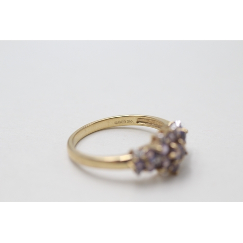 115 - 9ct gold tanzanite & diamond dress ring (2.4g) Size  P