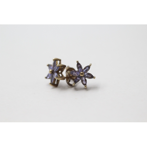 116 - 9ct gold tanzanite floral stud earrings (1.6g)