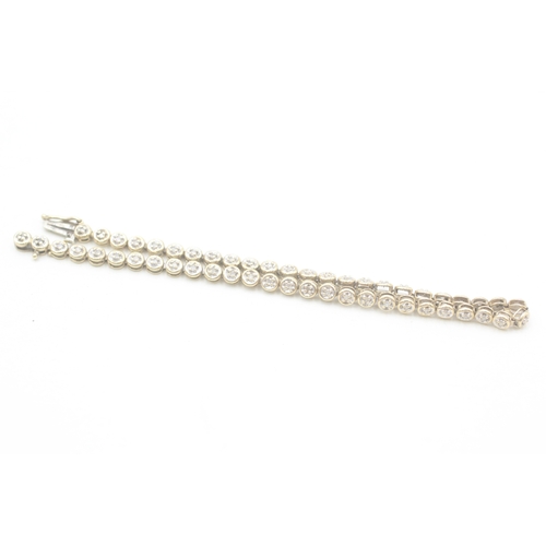 17 - 9ct gold diamond line bracelet (5.6g)