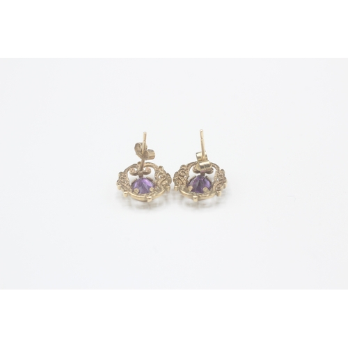 34 - 9ct gold amethyst stud earrings (1.3g)