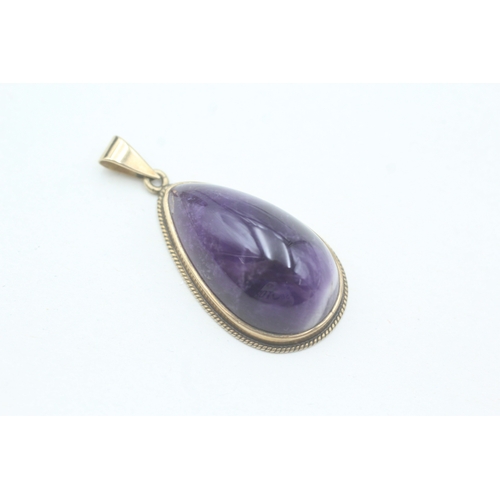 39 - 9ct gold amethyst pendant (7.5g)