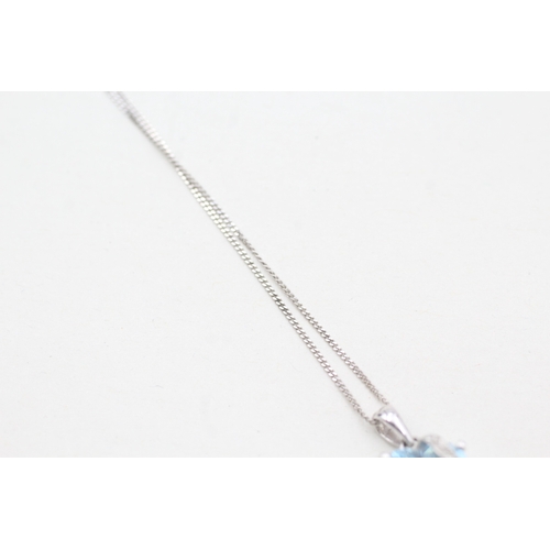 41 - 9ct white gold diamond & topaz heart pendant necklace (2.3g)