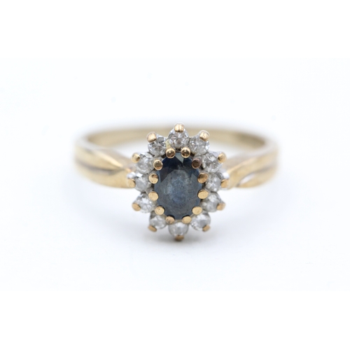 43 - 9ct gold diamond and sapphire halo ring (2.5g) Size  M